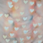 Romantikus, szív alakú bokeh fényekkel díszített fotóautomata háttér, lágy pasztell árnyalatokkal